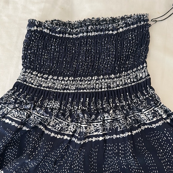 NWT multi print pants S. Never worn. They were too small for me. - Picture 5 of 5